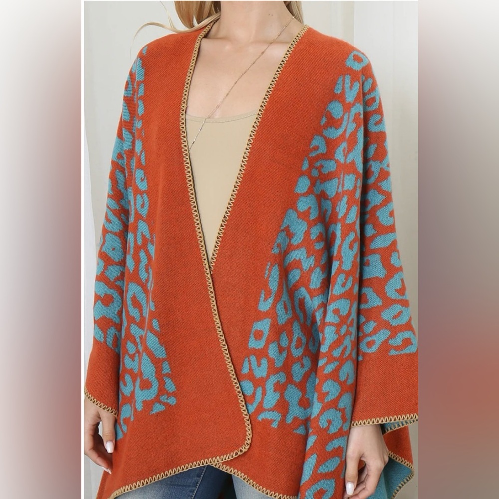 Wrap Poncho Beautiful Versatile. Wear on either side. 
Acrylic textile
#N013 - Picture 3 of 6